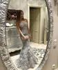 2018 New Silver Mermaid Feather Dresses Evening Wear Crystal Beaded Appliqued Sheer Jewel Neck Formal Prom Gowns Luxury Long Pageant Dress