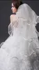 Fantastiska brudslöjor Vit Elfenben Soft Tulle Wedding Veil 4 Lager Slöjor Med Boned Edge Wave Bröllop Accessaries med Comb Ruffled