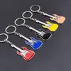 Musical Instrument Guitar Keychain Enamel key ring holder Bag Hangs fashion jewelry Promotion gift Black Red Blue