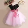 Flower Girl Dress Europa e America Paillette Bambini Festa di nozze Abiti da principessa Abito da ballo in nastro Big Bowknot Abbigliamento per bambini TR32