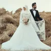 2021 White A Line Islamic Wedding Dresses Plus Size Bridal Gowns Jewel Neck Long Sleeves Lace Appliques Covered Button Sleeveless