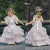 Blush Bohemian Flower Girl Dresses With Short Sleeves Tiered Lace Girls Pageant Gowns Vintage Kids Wedding Dress
