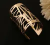 European New fashion style gold plated alloy opened cuff hollow out bangle bracelets for women jewelry