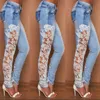 Jeans femininos plus size moda luz azul oco out lace floral costura lateral estiramento magro mulheres lápis S-XL