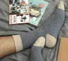 Großhandels-Kostenloser Versand 4Pairs Wellenlinien Fischgrätmuster Absätze Jacquard-Wollsocken männliche Kaninchen warme Herrenkleidsocken chaussette homme