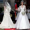 Bedövning Kate Middleton Bröllopsklänningar Royal Modest Bridal Gowns Long Långärmade Ruffles Katedral Tåg Skräddarsydda Högkvalitativa Brider