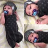 かわいい赤ちゃんロンパーススター閉じ込められたバナーノースリーブコットンロンスーツの衣装赤ちゃん男の子服女の子服幼児幼児服