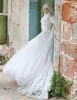 2021 White A Line Islamic Wedding Dresses Plus Size Bridal Gowns Jewel Neck Long Sleeves Lace Appliques Covered Button Sleeveless