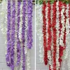 2017 Flower Wisteria wisteria الاصطناعية 10 كولورز DIY محاكاة الزفاف القوس الباب المنزل الجدار معلقة إكليل لحفل الزفاف ديكور حديقة الزفاف