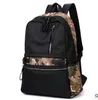 Целая совершенно новая кожаная сумка камуфляж Man рюкзак мода цветовые цветовые школьные мешки с камуфляжным сшиванием туристической сумки