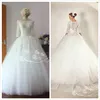 Corset Princess Ball Gown Wedding Dresses 2015 with 3/4 Long Sleeves Covered Buttons Back Bridal Gowns Lace Wedding Wear Real Pictures