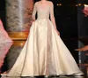 2015 Elie Saab Dresses Sheer Zroszony Puffy A-Line Sweep Pociąg Satyna Długie Formalne Suknie z aplikacjami Długie Rękawy Celebrity Suknie Suknie