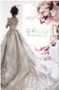 Glamorous Lace Ball Gown Wedding Dress Sheer Jewel Neck Long Sleeves Beaded Pearls Applique Bridal Dress Charming Chapel Train Wedding Gowns