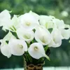 Ccalla lírio 2015 flor artificial pu real toque decoração de casa flores 50 pçs / lote casamento buquê bonito flores decorativas
