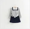 Nuovo 2018 Primavera Ragazze Stile Navy Set di abbigliamento Tshirt a righe a maniche lunghe per bambini Gonna 2 pezzi Abiti per bambini Vestiti per bambina Chil7374806