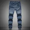 Hurtownia Nowa 2015 Męskie Stylowe Ripped Jogger Jeans Skinny Biker Jeans Perfumy 100 Oryginalny Plus Rozmiar M ~ 5XL Elastyczne Dżinsy