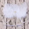 Baby Angel Wing жемчуг и бриллиантовый цветок Тонкая эластичная повязка на голову Набор для новорожденных Pretty Angel Fairy с белыми перьями Крыло Костюм Po Pro1707436
