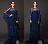 Robes de soirée en dentelle bleu royal musulman avec des plumes à paillettes perlées de soirée arabes brillants balayez le train enveloppe 2016 robes de bal 9070595