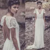 Bohemian Wedding Dresses Laure de Sagazan Sheath Sexy Bridal Gowns Backless V Neck Boho Beach Wedding Gowns Short Sheer Lace Sleeves