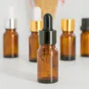 10ml Amber Glass Dropper Flessen voor essentiële olie met zwarte gouden dop voor cosmetische pakket Gratis verzending