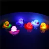 Anatra lampeggiante LED Light Up Toy Giocattoli da bagno per bambini Anatre galleggianti illuminate Giocattoli da bagliore per vasca da bagno per bambini