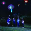 Increíble luz LED flecha cohete helicóptero juguetes voladores giratorios catapulta voladora juguete iluminado juguete chico fiesta Favor juguete divertido regalo elástico