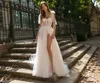 Sparkly een lijn Lovertjes Bohemian Trouwjurken Sweetheart Hals Side Split Bridal Jurken Tule Sweep Trein Geappliceerd Robe de Mariée