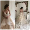 2019 Nuovi abiti da sposa sexy Una linea con scollo a V Spaghetti Tulle Appliques in pizzo Backless Sweep Train Summer Beach Plus Size Abiti da sposa formali