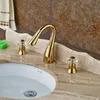 Rubinetto per lavabo dorato con doppia maniglia Rubinetto per lavabo diffuso su piano per vasca da bagno Rubinetto per lavabo a 3 fori Rubinetto caldo freddo