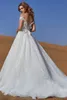 CocoMelody 2019 Abiti da sposa con spalle scoperte Appliques in pizzo Abiti da sposa bohémien Abito da sposa senza schienale Sweep Train A-Line abito da sposa robe de mari￩e