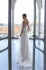 2020 Sexy Doria Karlozi Bröllopsklänningar Jewel Lace Ärmlös Abiti da Sposa Tulle Beaded Sweep Train En Linje Beaded Bride Dress