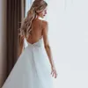 Modest A Line Beach Wedding Dresses Spaghetti Sleeveless Beads Appliques Tulle Wedding Dresses Sweep Train Boho Bridal Gowns