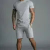 Mens Fashion Hiphop Streetwear T Shirt Tracksuits Sätta Designer Cardigan Kort Byxor Sportkläder Kläder Sats Outfits Suit Fitness Gym för Man