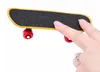 Tryck p￥ professionell legering Standing Fingerboard Truck Toy Mini Finger skateboard f￶r barn Toy Boy Children Gift