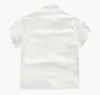 Naturalny biały kolor chłopcy koszule sweter sprawdzona koszula z krótkimi rękawami z przodu kieszonkowy projekt wygodne zużycie przez1009