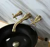 Rubinetto per lavabo da bagno Rolya in bronzo Doppi manici a croce Set di miscelatori per lavabo da parete in rame massiccio vintage