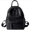 Barato mochila mulheres moda saco de viagem de couro macio super grande volume bolsas com um punho absolutamente alto custo eficaz