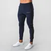 Pantaloni sportivi da uomo stile jogger uomo palestre allenamento fitness pantaloni maschili casual pantaloni skinny con M-2XL1