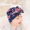 New Infant Neonate Cappello Bowknot Florals Copricapo Bambino Bambino Bambini Berretti Turbante Fiori Cappelli Bambini Cappello in cotone 6 colori 15376