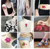 Tatuaggi 52 Pz/lotto set di tatuaggi temporanei farfalla colorata uccello decalcomania fiore adesivo tatuaggio femminile bambini Flash Tattoo braccio spalla adesivo