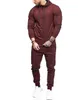 Designer haute qualité hommes survêtement hommes sport costume bras fermeture éclair décoration fitness pantalons longs 2 pièces vêtements ensembles283k