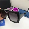 Gafas de sol populares de alta calidad Mujeres Hombres Diseñador de marca Estilo de verano Cuadrado Protección UV de marco completo con estuche al por menor