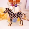 Animal zebra cavalo chaveiro pingente carro chaveiro acessórios strass esmalte gotejamento liga de óleo chaveiro titular moda feminina b254k