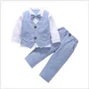 Stile gentiluomo 2020 Nuovi set di abbigliamento per neonati Bel ragazzo a righe Top con papillon + pantaloni 2 pezzi Set Abiti per bambini Set per bambini