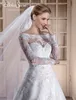 Eleganckie białe suknie ślubne z ramion długie rękawie koronkowe aplikacje seksowne guziki ślubne sukienki ślubne urocze suknie ślubne