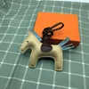 Pu paard Bag Charm Toy Groothandel Handtas Tote Hanger High-end Fashion Leuke willekeurige kleur