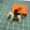 PU Horse Bag Charm zabawka Whole torebka Tote Wiselant Wysokiej jakości moda Śliczna losowa kolor306y