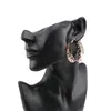 Offre spéciale femmes creux filigrane doré Rose or Vintage grand cerceau boucles d'oreilles National boîte de nuit boucle d'oreille bijoux pour femmes en gros à vendre