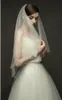 New Vintage Tea Length Lace Tulle Vestido de noiva curto com tiras de espaguete Top de renda Saia de tule Praia Informal Vestidos de noiva