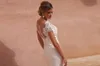 2020 Elegante Meerjungfrau Brautkleider Kurzarm Covered Button Applikationen Satin Brautkleider Sweep Zug Vestidos De Novia